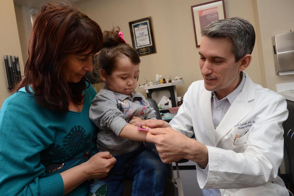 mom with baby during a visit to the doctor